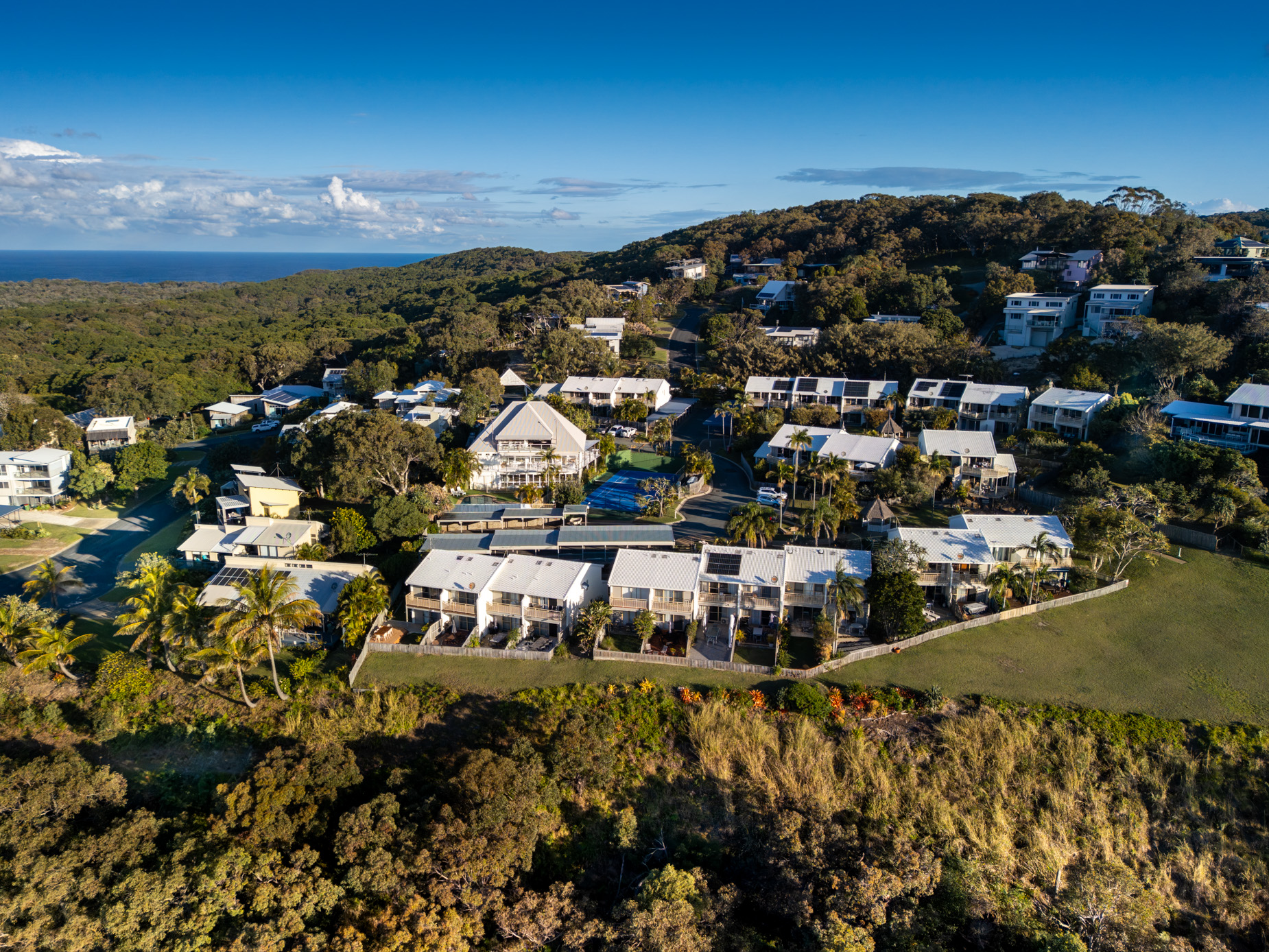 Pandanus Palms Resort set among coastal bushland above the sea at Point Lookout