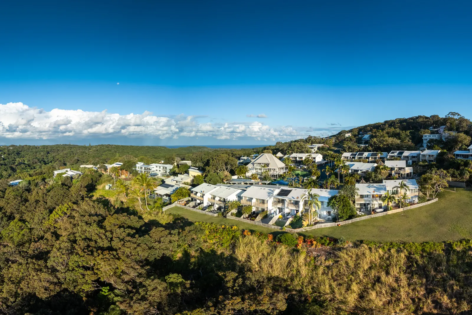 The open grassed headland reserve beside Pandanus Palms Resort, looking out over the ocean