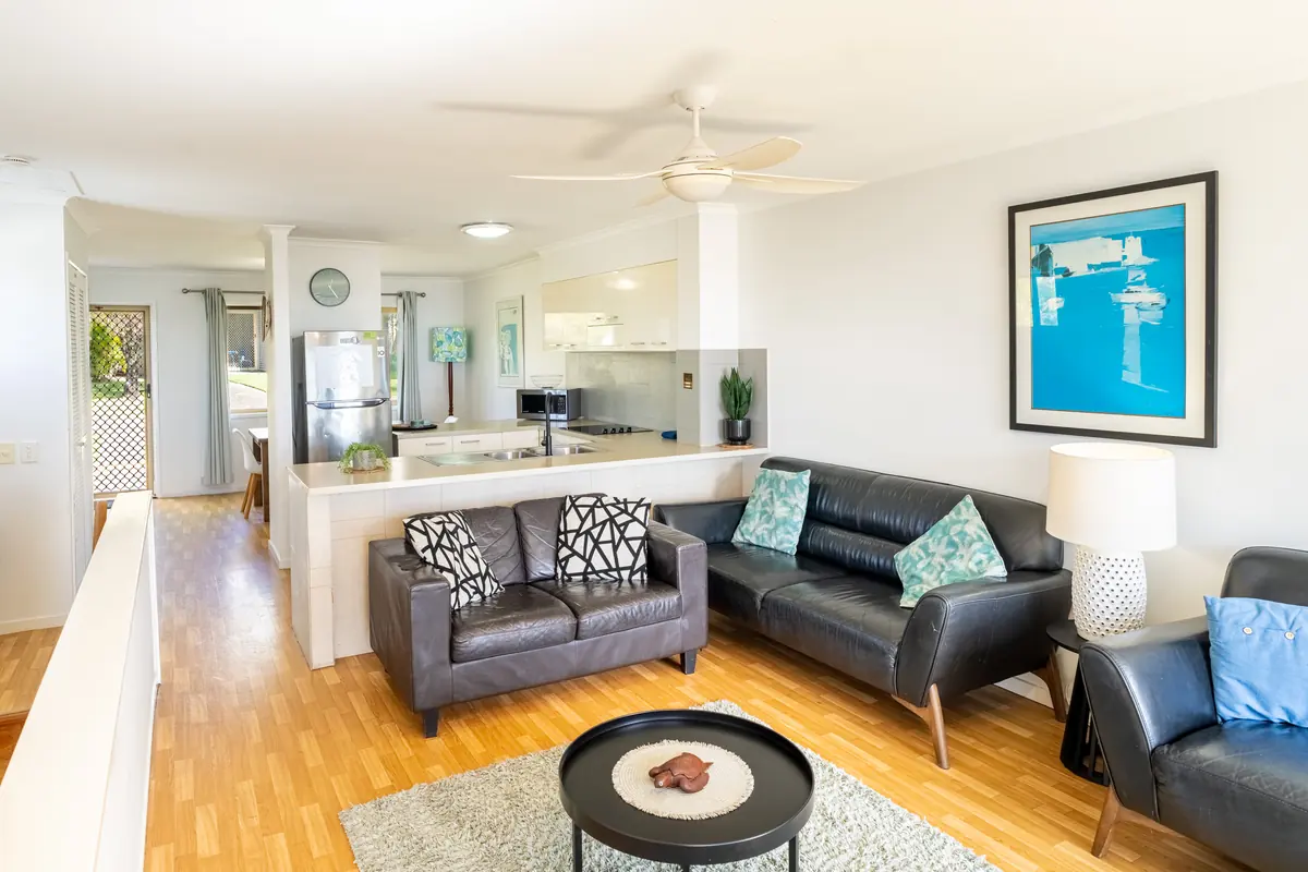The open plan living room of the three bedroom Standard Ocean villa